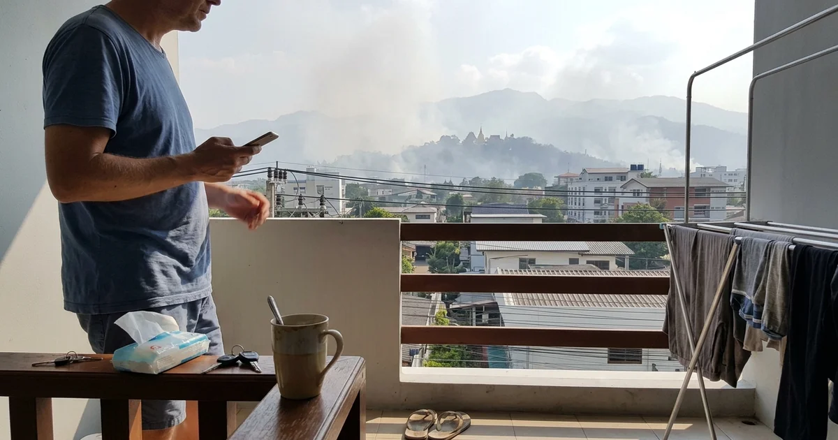 The Chiang Mai skyline with Doi Suthep barely visible through smoke